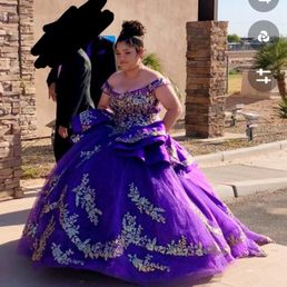 Thank you ladies at the Valerie's Bridal Boutique y'all made this possible .