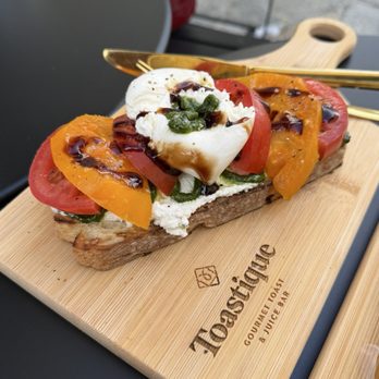 Toastique - Tomato Burrata Toast - Juice Bars & Smoothies Near Me - Los Angeles, California Toastique - Tomato Burrata Toast - Juice Bars & Smoothies Near Me - Los Angeles, California