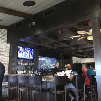 Cheddar's Scratch Kitchen - 2 TV's in bar. Pretty fish! - American Near Me - Orlando, Florida Cheddar's Scratch Kitchen - 2 TV's in bar. Pretty fish! - American Near Me - Orlando, Florida