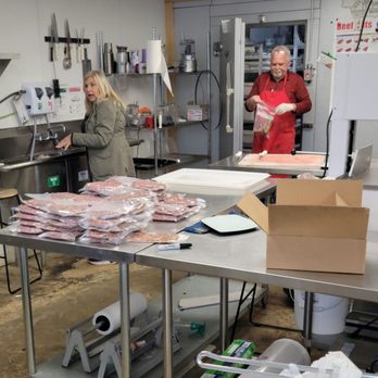Bayou Boucherie - a man and a woman in a kitchen - Meat Shops Near Me - Raceland, Louisiana Bayou Boucherie - a man and a woman in a kitchen - Meat Shops Near Me - Raceland, Louisiana
