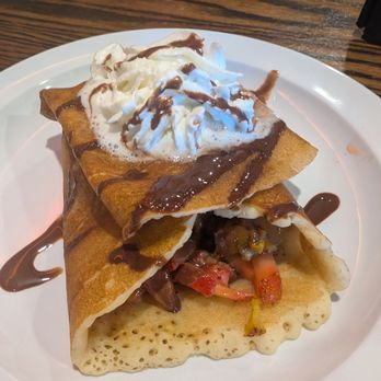 Kalaveras - Strawberry, peach, and banana crepe with chocolate and whipped cream - Breakfast & Brunch Near Me - Newport Beach, California Kalaveras - Strawberry, peach, and banana crepe with chocolate and whipped cream - Breakfast & Brunch Near Me - Newport Beach, California