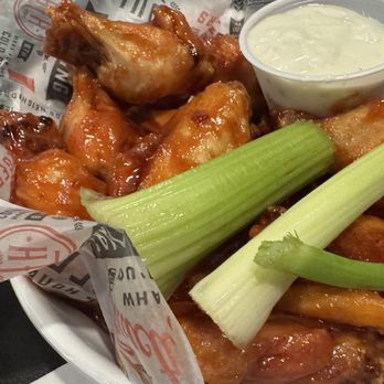Boulder Tap House - Medium (12) order of wings with their honey BBQ sauce and blue cheese. - Sports Bars Near Me - Ames, Iowa Boulder Tap House - Medium (12) order of wings with their honey BBQ sauce and blue cheese. - Sports Bars Near Me - Ames, Iowa