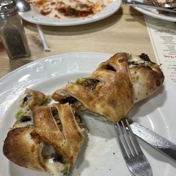 Muzzarella Pizza & Italian Kitchen - Stromboli - Pizza Near Me - Orlando, Florida Muzzarella Pizza & Italian Kitchen - Stromboli - Pizza Near Me - Orlando, Florida