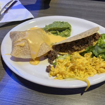 Rudy's Grill and Cantina - First plate of the Acapulco combo. Crispy beef taco and queso poof. - Mexican Near Me - Cypress, Texas Rudy's Grill and Cantina - First plate of the Acapulco combo. Crispy beef taco and queso poof. - Mexican Near Me - Cypress, Texas