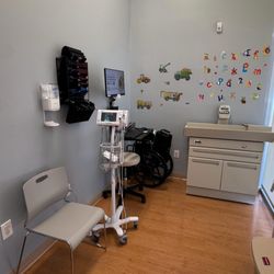 AltaMed - Peck Rd - An internal view of a Pediatrics check-in room for first time and returning visitors.