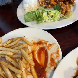 Orange Chicken and Garlic Fries Orange Chicken and Garlic Fries