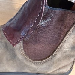 Leon's Shoe Repair - Glue residue and messily cut patch