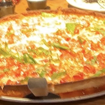 Hideaway Pizza - Poorly exposed photo of the Margherita pizza with the 90 degree angled crust wall - Italian Near Me - West Little Rock, Arkansas Hideaway Pizza - Poorly exposed photo of the Margherita pizza with the 90 degree angled crust wall - Italian Near Me - West Little Rock, Arkansas