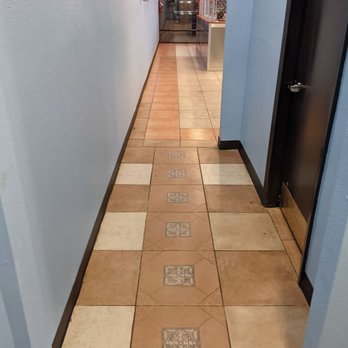 DaDam Crab - a long hallway with tiled floors - Seafood Near Me - Houston, Texas