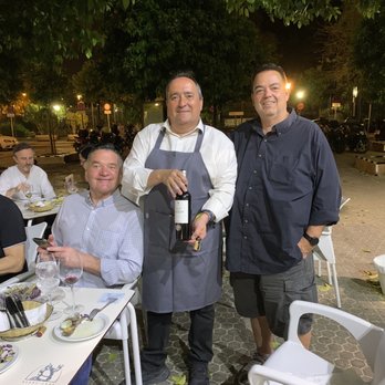Modesto - Our waiter Alejandro and a couple of members of our group at Modesto's - Spanish Near Me - Seville, SE