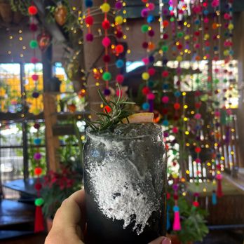 Outpost - Black Paloma - tequila reposada, organic activated carbon, grapefruit juice, lemon and tortilla salt with garnish of rosemary sprig - Mexican Near Me - Cabo San Lucas, BCS Outpost - Black Paloma - tequila reposada, organic activated carbon, grapefruit juice, lemon and tortilla salt with garnish of rosemary sprig - Mexican Near Me - Cabo San Lucas, BCS