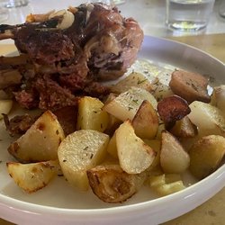 Osteria Da Bortolino S.n.c. - Pig shine perfectly seared on the outside and tender on the inside. How do Italians make potatoes traste so good?