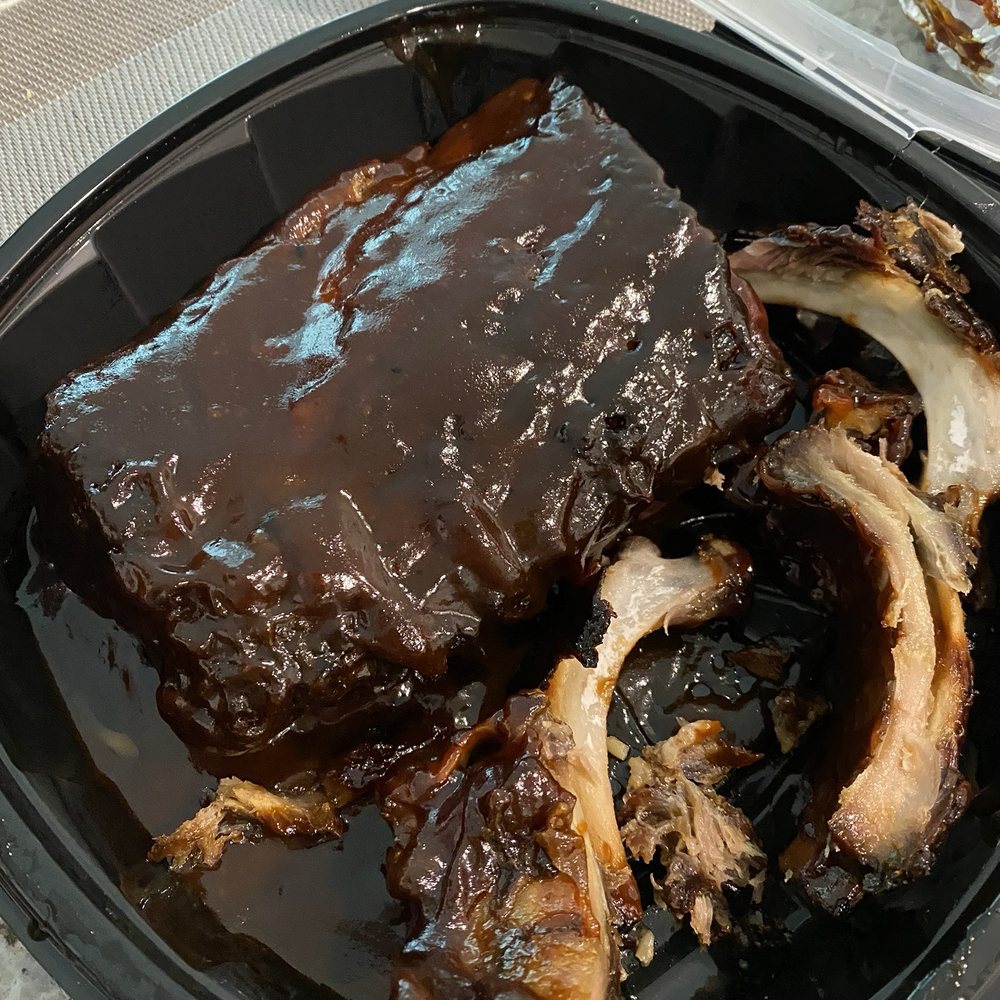 Texas Roadhouse - Burnt, inedible ribs drenched in sauce to hide the condition. - Steakhouses Near Me - Kingwood, Texas Texas Roadhouse - Burnt, inedible ribs drenched in sauce to hide the condition. - Steakhouses Near Me - Kingwood, Texas