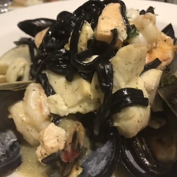 Uncle Peter's - Seafood with black linguine - Italian Near Me - Jackson Heights, New York Uncle Peter's - Seafood with black linguine - Italian Near Me - Jackson Heights, New York