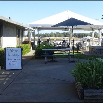 Wings Grill & Espresso Bar - As you walk up to the restaurant, you'll see a welcome sign, the new extended patio, and lots of airplanes parked on the ramp. - Breakfast & Brunch Near Me - Auburn, California