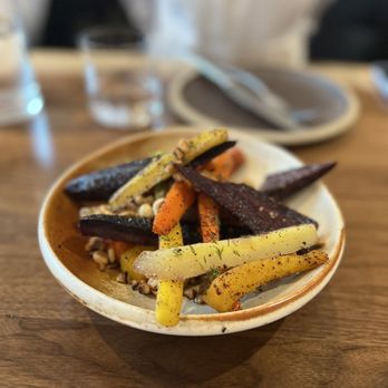 Terra - roasted carrots tossed with dill, hazelnuts, and i think butter (decent) - Tapas/Small Plates Near Me - Jasper, Alberta