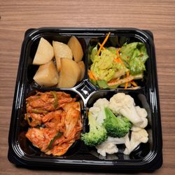 New Korea Restaurant - Banchan: potatoes, light salad, boiled broccoli and cauliflower, and more kimchi.