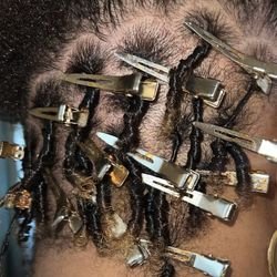 Starter Locs - Thinking about starting locs? We specialize in creating beautiful, healthy starter locs tailored to your unique style and hair texture. Let us guide you on your loc journey with expert care and personalized attention.