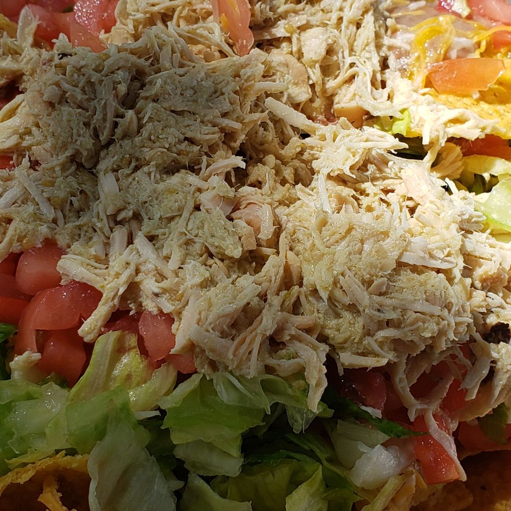 Shamrock Tacos - What was supposed to be chicken fajita That I was charged 1.00 more is shredded..seriously! And where is the  cheese being nachos? - Tacos Near Me - Wimberley, Texas