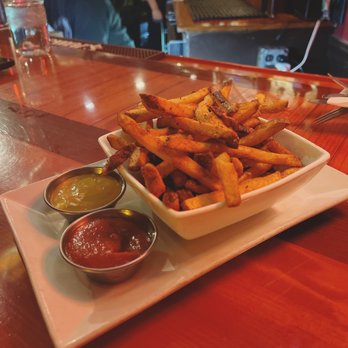 The Bad Apple - Fries in Old Bay with Carolina Mustard BBQ - Burgers Near Me - Chicago, Illinois The Bad Apple - Fries in Old Bay with Carolina Mustard BBQ - Burgers Near Me - Chicago, Illinois