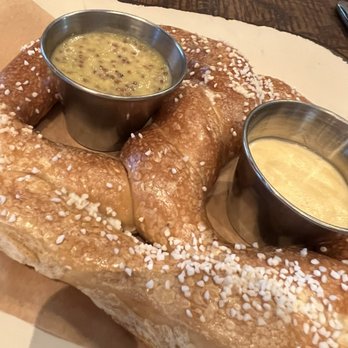New Realm Brewing - Pretzel Appetizer with mustard and beer cheese - Brewpubs Near Me - Charleston, South Carolina New Realm Brewing - Pretzel Appetizer with mustard and beer cheese - Brewpubs Near Me - Charleston, South Carolina