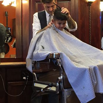 Head Honchoz - He argued with us on the way to the shop to get his hair cut but you can see a smile their. - Barbers Near Me - Prunedale, California