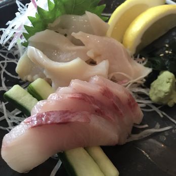 Sushi Den - Yellow tail and giant clam - Japanese Near Me - Denver, Colorado Sushi Den - Yellow tail and giant clam - Japanese Near Me - Denver, Colorado