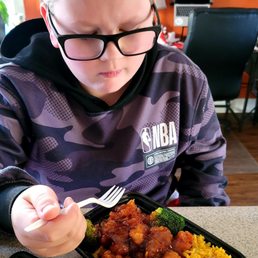 ...testing his General Tso's entree ...testing his General Tso's entree