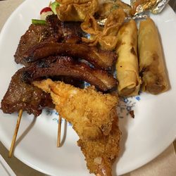 Treasure Pot Chinese Restaurant - Poo poo appetizer platter. Brought home for my guests. Terrible!