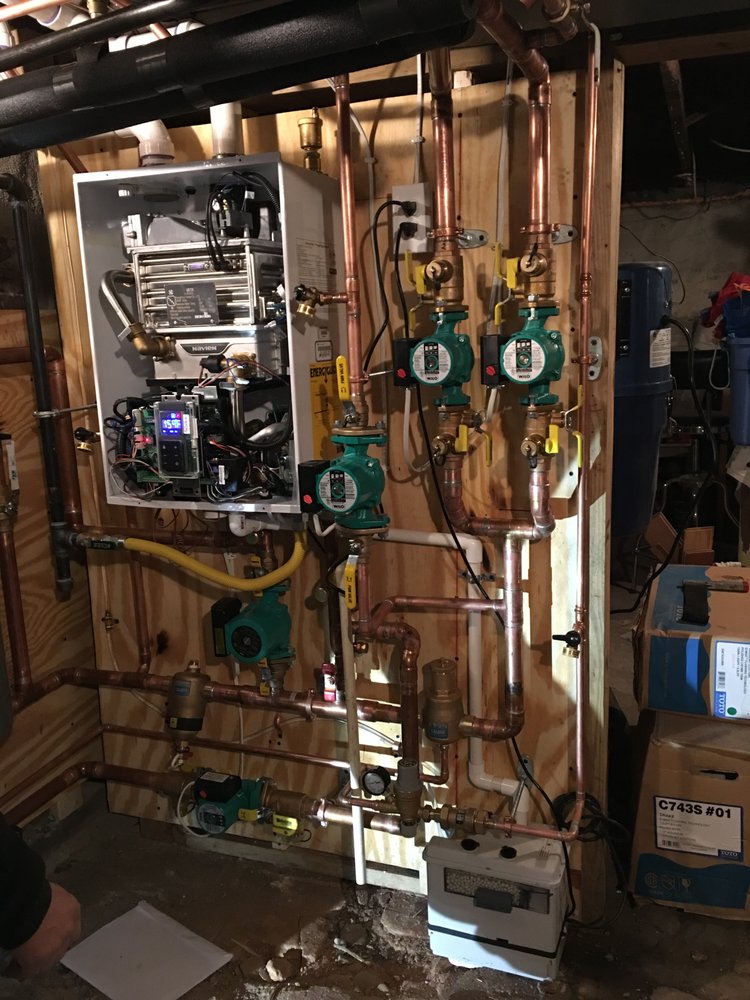 Slide of JM Plumbing & Heating