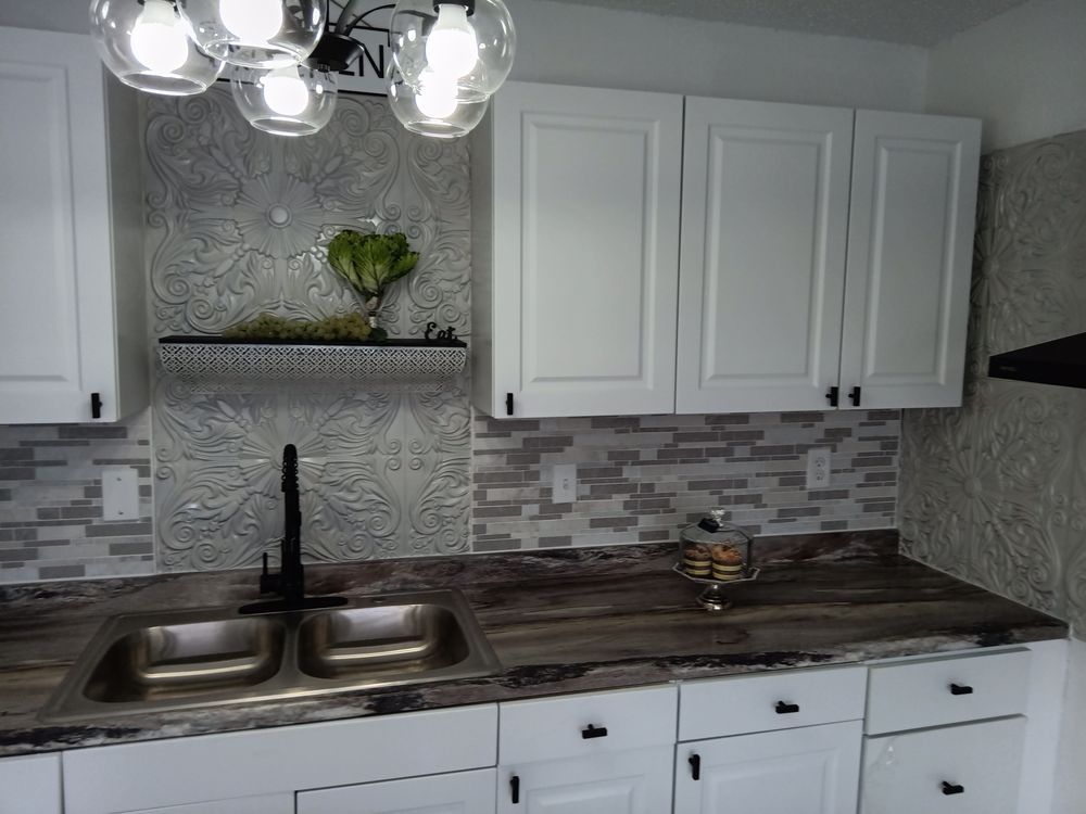Slide of JT Reface Plumbing and Construction