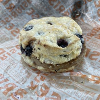 Rise Southern Biscuits & Righteous Chicken - Glazed Blueberry Biscuit with sausage - Breakfast & Brunch Near Me - Gaithersburg, Maryland Rise Southern Biscuits & Righteous Chicken - Glazed Blueberry Biscuit with sausage - Breakfast & Brunch Near Me - Gaithersburg, Maryland