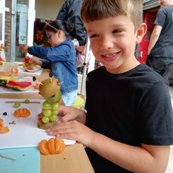 Happy Go Cooking - Fruit bug stand, set up to encourage local children to eat healthily at an open community event!