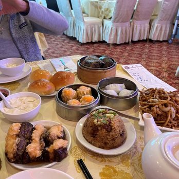 China Star - L-R front: eggplant stuffed w shrimp, sticky rice, udon noodles; 2nd row: sweet tofu; siu mai, shrimp & chive dumplings; top bbao; - Dim Sum Near Me - Lowell, Massachusetts