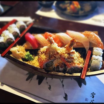 Yoon Sushi - a plate of sushi with chopsticks - Sushi Bars Near Me - Canton, Georgia Yoon Sushi - a plate of sushi with chopsticks - Sushi Bars Near Me - Canton, Georgia
