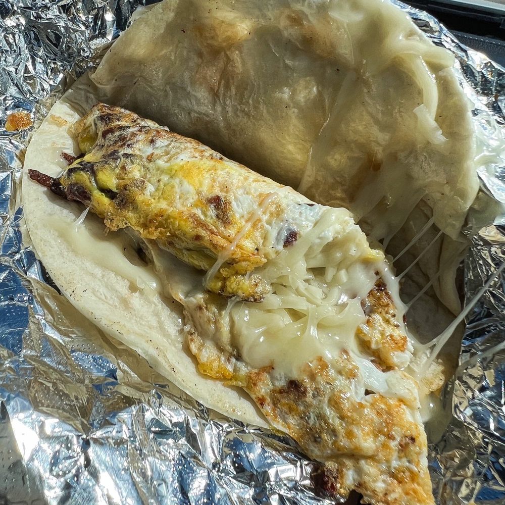 Bella Tacos - Breakfast taco (love the cheese melting nicely)! - Food Trucks Near Me - Cedar Park, Texas