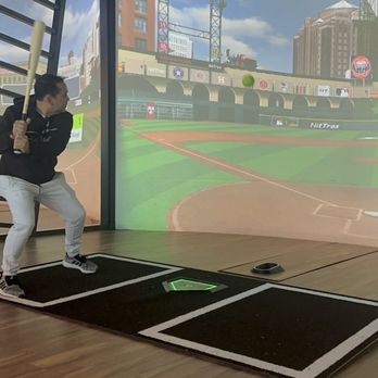 Home Run Dugout - Getting serious at the batting cage - American Near Me - Katy, Texas