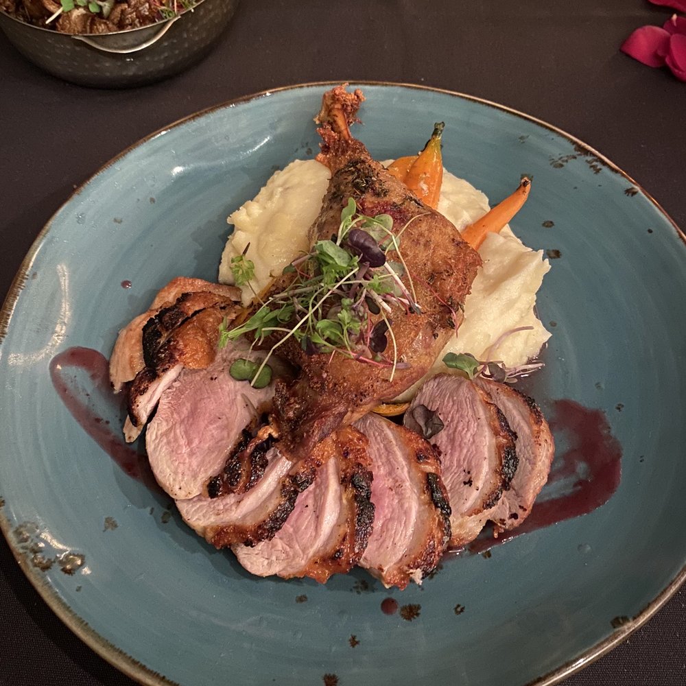 CuiZine Restaurant - Crispy duck confit on whipped potato's and garlic roasted carrots - Seafood Near Me - Satellite Beach, Florida