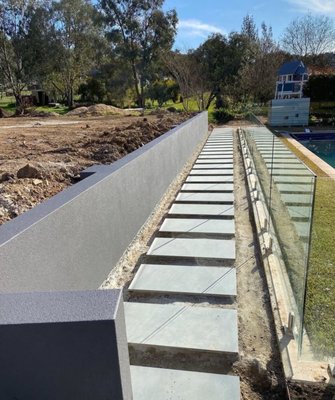 Concrete & Masonry Services - Extend Your Outdoor Living Space!

Arrange for concrete installation services in Escondido, Vista, CA or surrounding areas
Timeless Design and Build uses durable concrete to install a wide range of surfaces for homeowners in Escondido and Vista, CA. If you want to upgrade your exterior with a new walkway or driveway, turn to us for concrete installation services. 

We can handle your project quickly and smoothly, making sure that every pour is made with great care and precision. You’ll appreciate that we can do traditional flatwork and stamped concrete.

Our licensed and insured concrete contractors can make your next project successful. Rely on us to install:

Concrete Steps 
Concrete driveways
Concrete walkways
Concrete building pads
Concrete retaining walls
...and so much more!

Contact us today to get a free estimate on personalized concrete installation services!