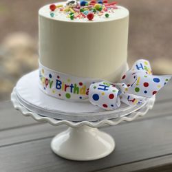 PKs Custom Cakes - Very simple, homemade birthday cake with celebratory ribbon and sprinkles!