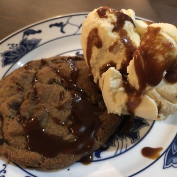 XO Restaurant - Gooey chocolate chip cookie and ice cream with caramel drizzle - Asian Fusion Near Me - Honolulu, Hawaii XO Restaurant - Gooey chocolate chip cookie and ice cream with caramel drizzle - Asian Fusion Near Me - Honolulu, Hawaii