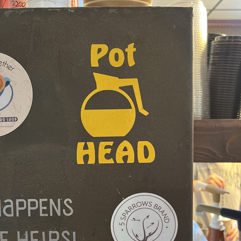 Brew Ha - a pot head sign on a shelf - Cafes Near Me - Columbia City, Indiana Brew Ha - a pot head sign on a shelf - Cafes Near Me - Columbia City, Indiana