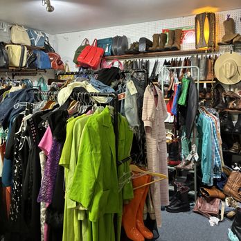 Olympia Antique Mall - area with clothing, boots and hats - Antiques Near Me - Olympia, Washington Olympia Antique Mall - area with clothing, boots and hats - Antiques Near Me - Olympia, Washington