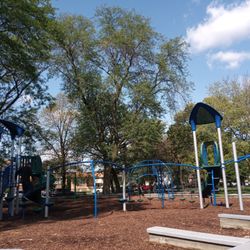 Chicago Park District - Pasteur Park - Children's playground appointed with jungle area and swings. Trees offer lots of shade on hot days