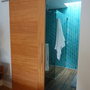 Green Construction - The barn door to the bath, added a skylight and a large curbless shower and a wall of Heath tiles. Floor is porcelain wood look tile! - General Contractors Near Me - Fremont, California Green Construction - The barn door to the bath, added a skylight and a large curbless shower and a wall of Heath tiles. Floor is porcelain wood look tile! - General Contractors Near Me - Fremont, California