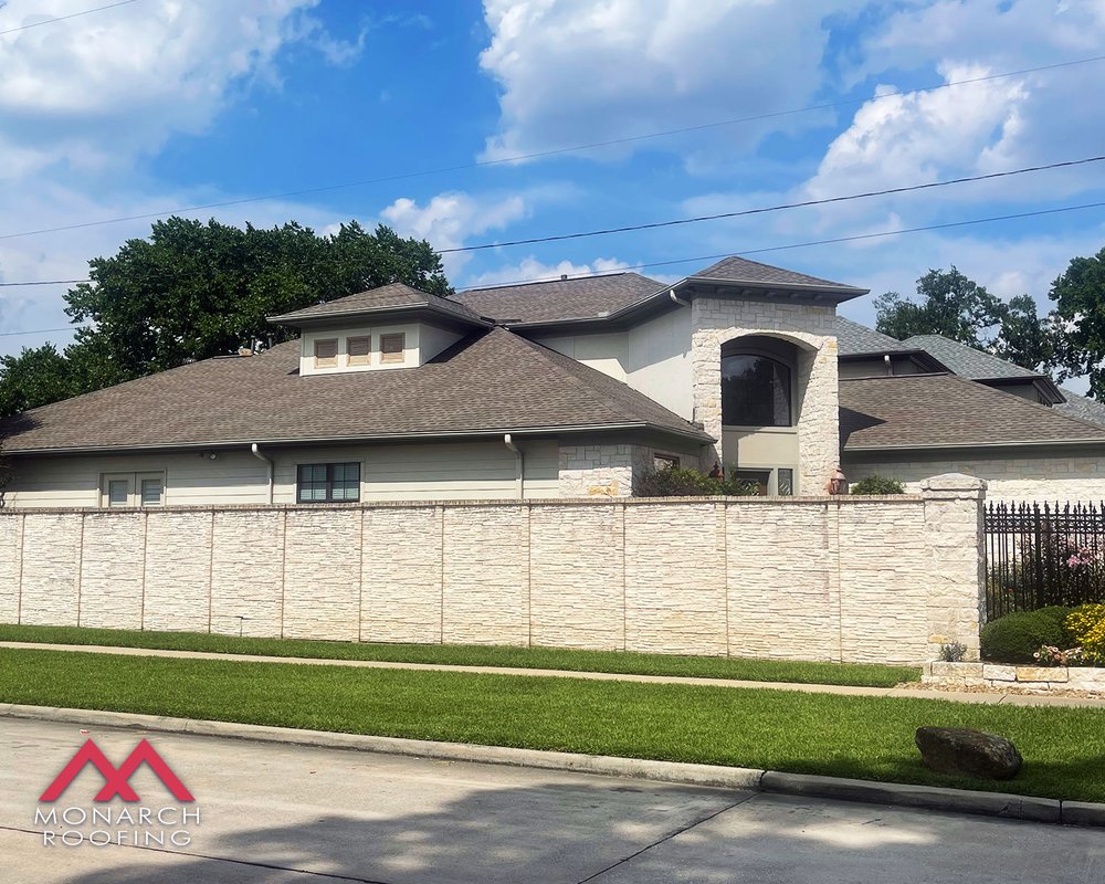 Slide of Monarch Roofing