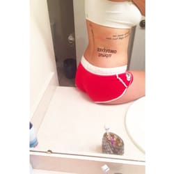 Unify Tattoo - "Family First" written in Greek on my lower back done by Bart Andrews!