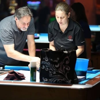 Bogies Billiards - a man and a woman playing pool - Pool Halls Near Me - Houston, Texas Bogies Billiards - a man and a woman playing pool - Pool Halls Near Me - Houston, Texas