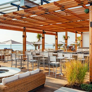 The Deck Seagrill & Bar - outdoor seating area - Cocktail Bars Near Me - Virginia Beach, Virginia The Deck Seagrill & Bar - outdoor seating area - Cocktail Bars Near Me - Virginia Beach, Virginia