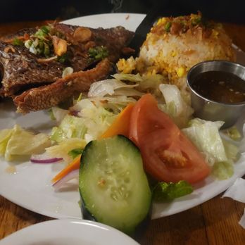 Quinn's Lighthouse - Whole carp with rice and salad. - Seafood Near Me - Oakland, California